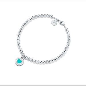 Tiffany & Co. round heart charm bracelet